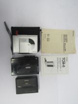 A Sony MZ-R37 portable minidisc recorder, Aiwa HS-PX310 portable cassette recorder (hinge damaged)