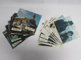 Two sets of eight cinema front of house lobby cards for Clint Eastwood films 'Paint Your Wagon' (