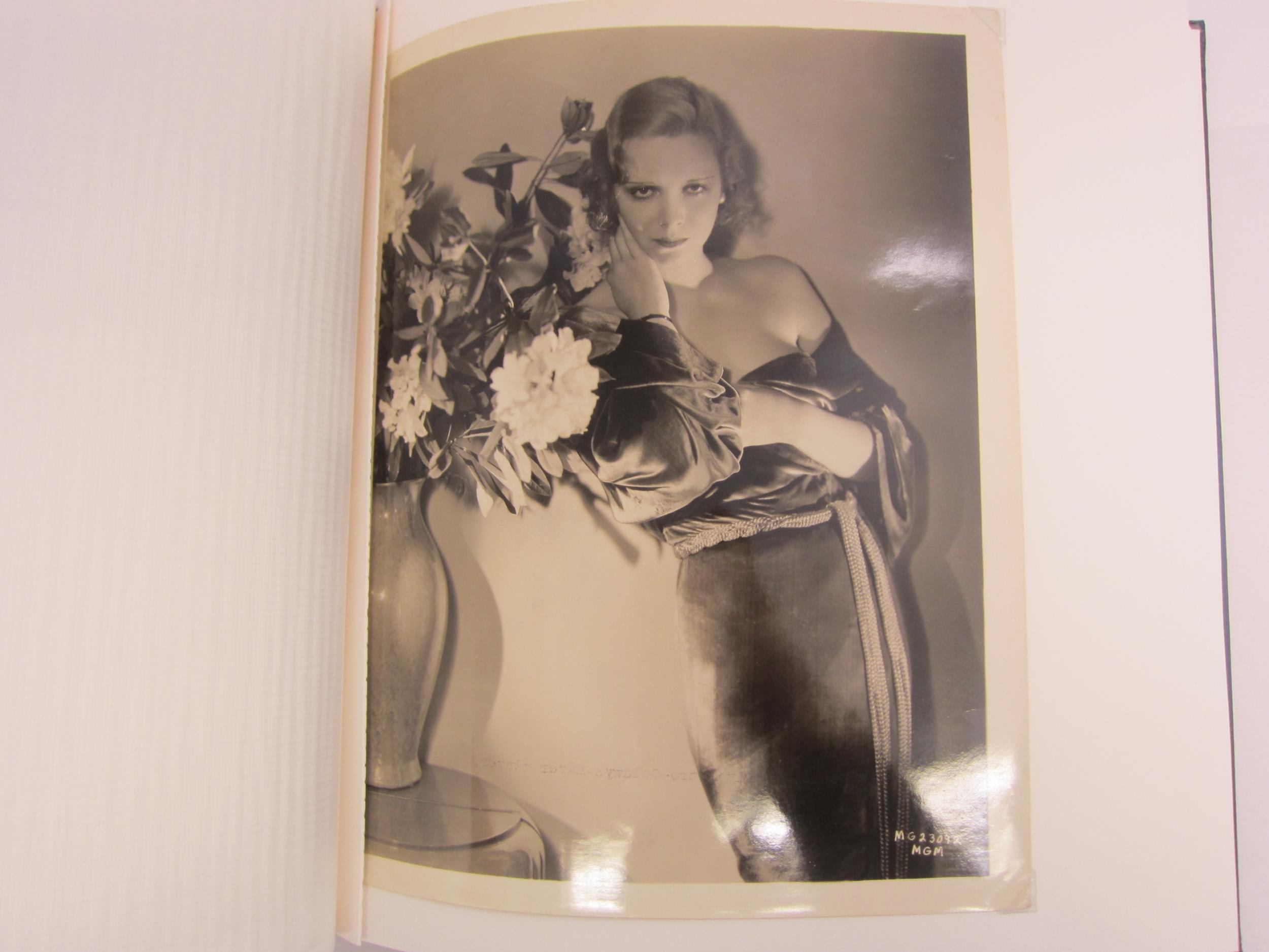 An album containing a collection of twenty-four 1930's 8" x 10" film star publicity photographs, - Image 13 of 24