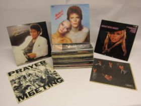 A collection of assorted Rock, Pop, and Folk LPs including David Bowie, Queen, Guns n Roses '