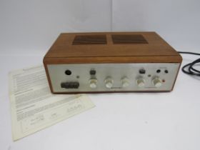 A Rogers Ravensbrook tuner amplifier in teak case with brushed aluminium front