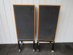 A pair of Kef Model 104 teak cased speakers with metal stands