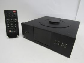 A Pro-Ject CD Box RS top loading CD transport, with remote control and adapter, serial no. E28476