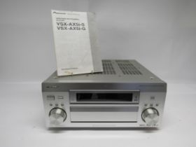 A Pioneer VSX-AX5i AV multi-channel receiver, with remote control and instruction manual