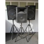 A Skytec 150.157 powered speaker on stand and a pair of Skytec 170.734 300 watt PA speakers on