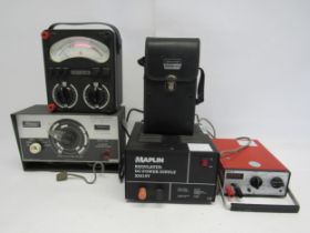 A collection of electrical testing equipment to include Mercury Model 1400 in-circuit capacity