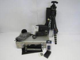 A cased Zoom Q8 digital video recorder with manual, Zoom SSH-6 Stereo Shotgun Microphone and