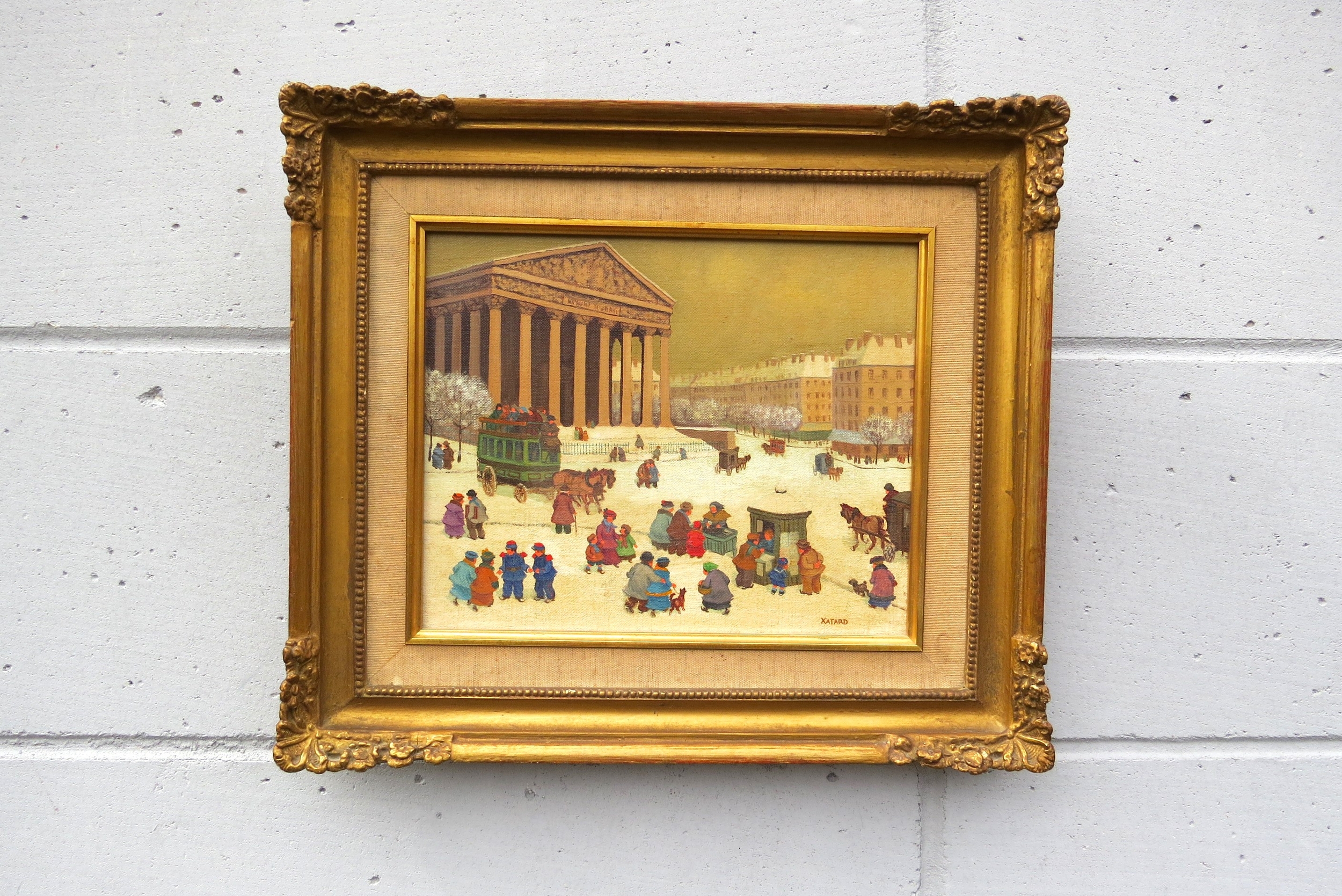 JEAN AXATARD (French b.1931) A gilt framed oil on canvas, figures in a snowy street scene. Signed