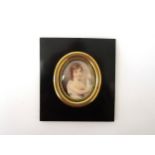 A mid 19th Century miniature watercolour on oval ivory panel, portrait of Agnes Fawcett Aged 6 Years