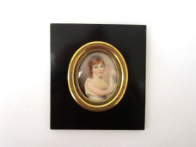 A mid 19th Century miniature watercolour on oval ivory panel, portrait of Agnes Fawcett Aged 6 Years