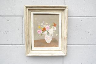 ANGELA BURFOOT (1934-2006) A framed oil on board, still life study depicting a jug of flowers.