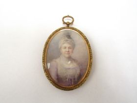 AIME DUPONT (Belgian/American 1842-1900) A miniature watercolour on oval ivory panel, portrait of