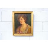 A late 19th, early 20th Century oil on canvas, portrait of a lady. Signed bottom left 'Ogilvie',