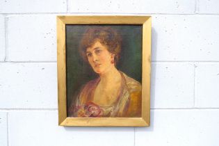 A late 19th, early 20th Century oil on canvas, portrait of a lady. Signed bottom left 'Ogilvie',