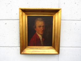 A late 18th / early 19th Century portrait of a gentleman wearing a red jacket and white cravat,