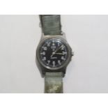 A Cabot Watch Company (CWC) military Quartz wristwatch, black dial with numerals. Back cover