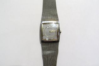 A Skagen Denmark lady's steel wristwatch with rectangular face, with box, warranty card, etc