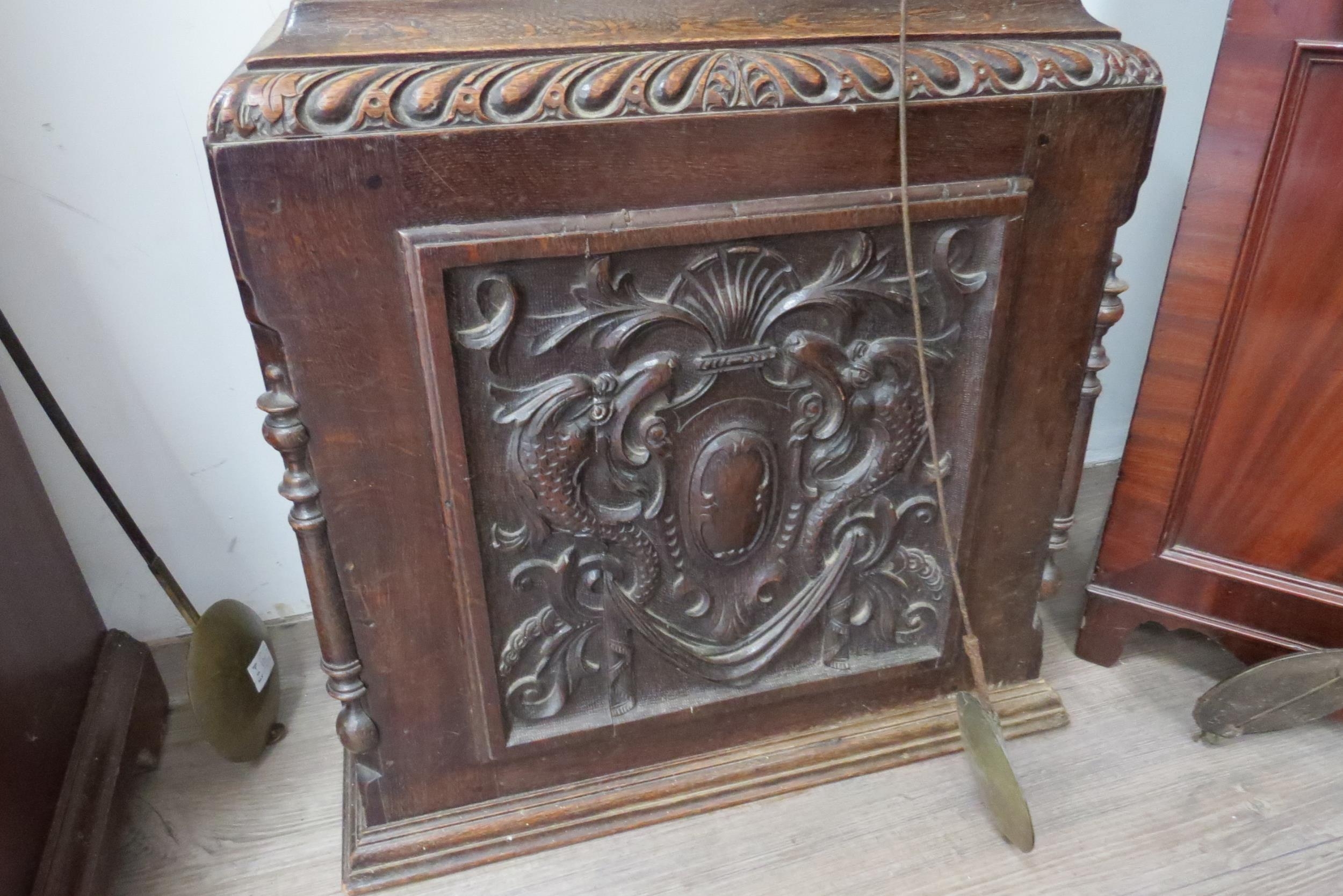 An 18th Century heavily carved oak longcase clock with silvered Roman chapter ring, date and seconds - Image 8 of 8