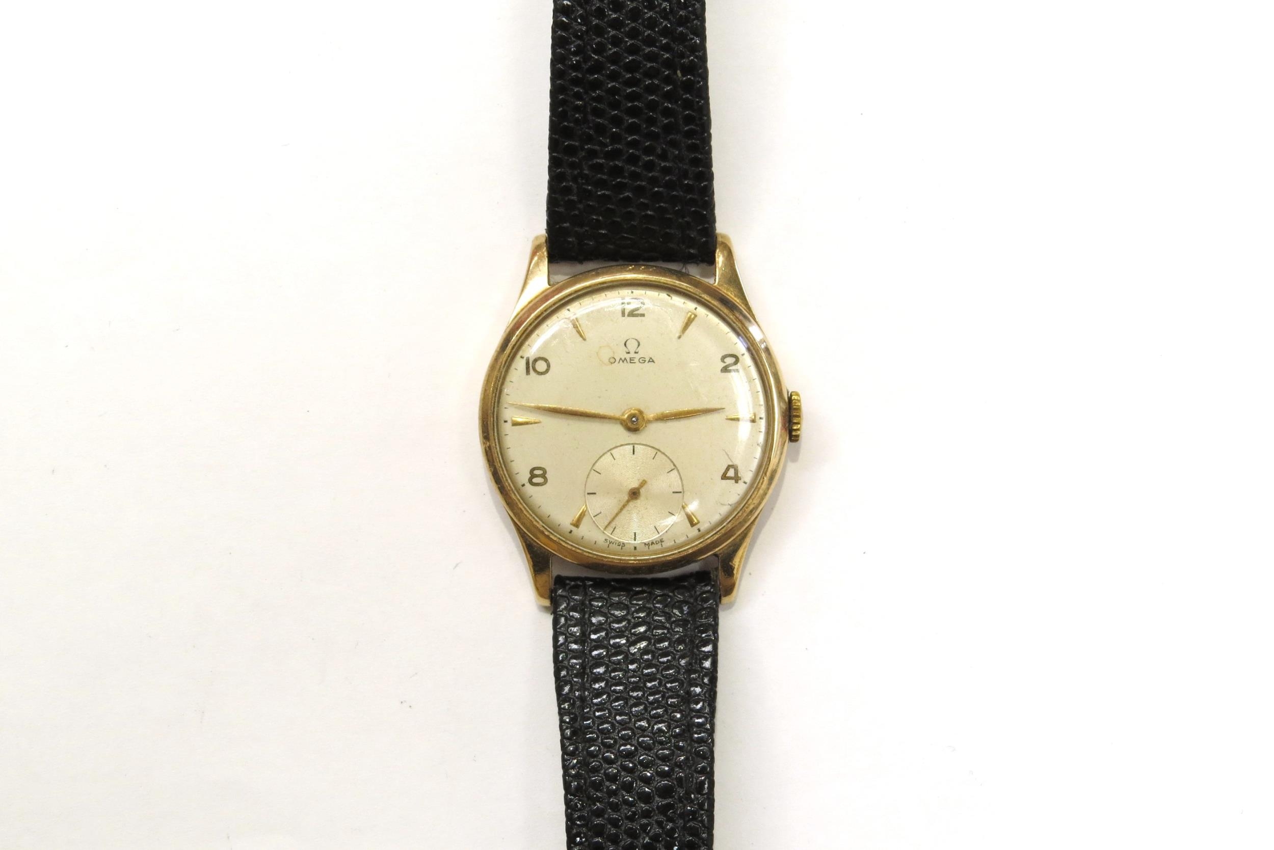 A mid 20th Century 9ct gold cased Omega gentleman's wristwatch with subsidiary seconds dial, on