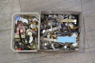 Two tubs of mixed watches, some incomplete / a/f
