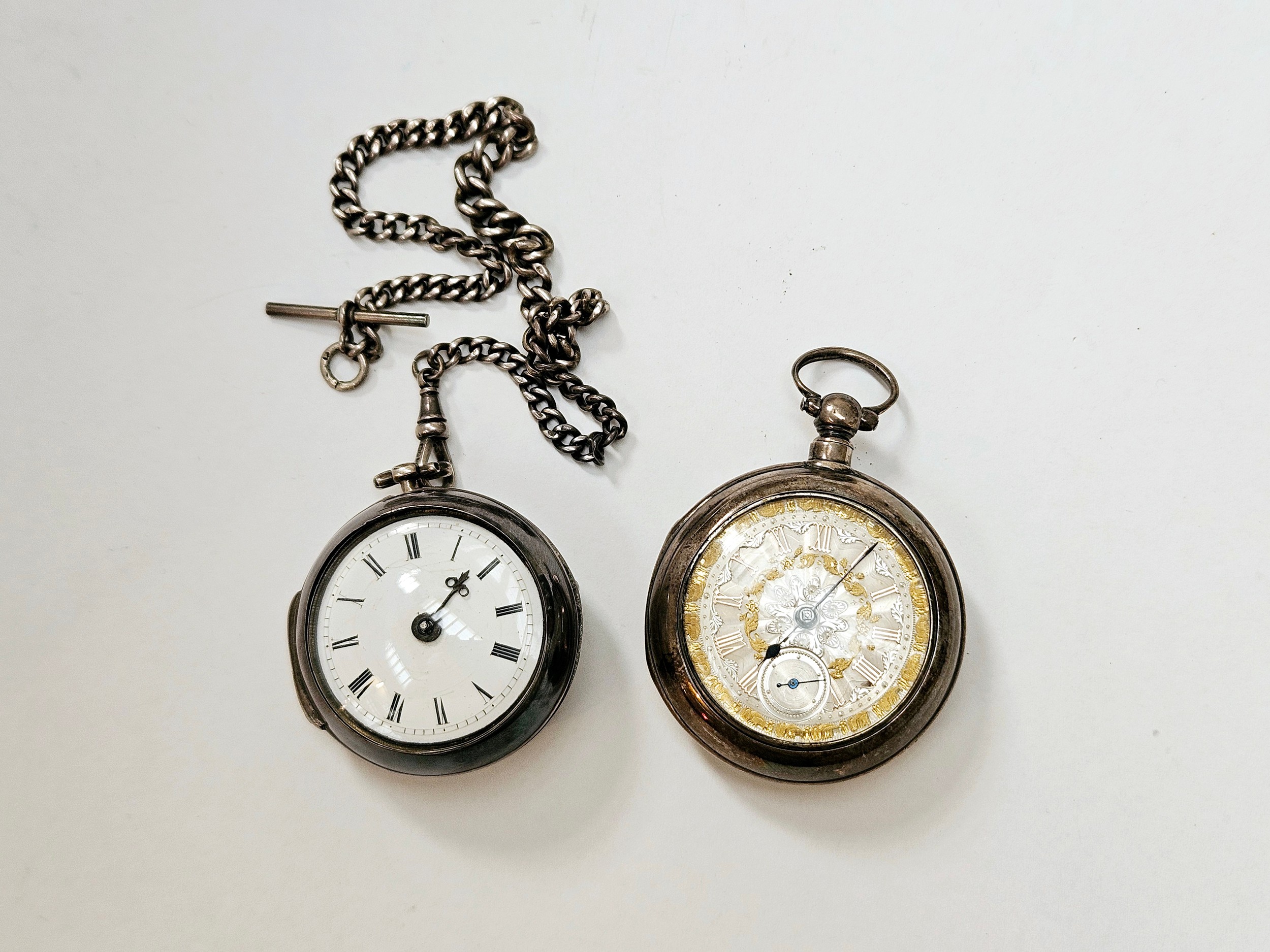 Two 19th Century silver cased pair case pocket watches, one with fusee movement and verge