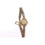 A 9ct gold Rolex Precision ladies wristwatch on gold strap