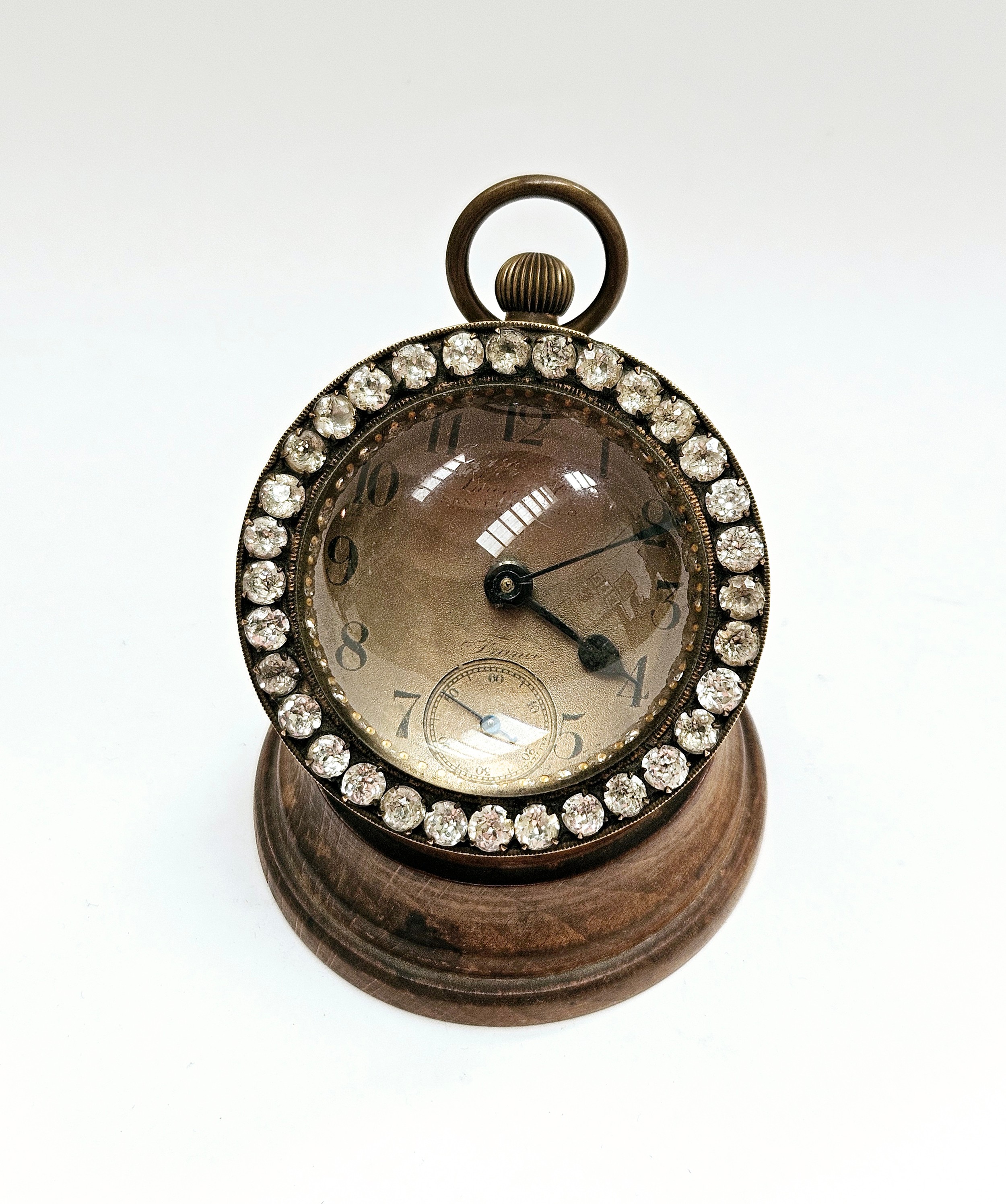 An American paperweight clock with French movement, Arabic numerals with subsidary seconds dial,