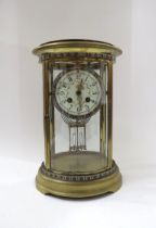 A late 19th Century French brass cased Champleve enamel two train mantel clock with Arabic numerals,