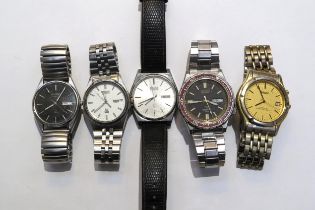 Five Seiko wristwatches including four Quartz and one automatic SQ x 2, SQ100, SQSports 100