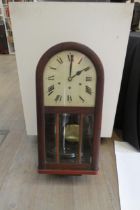 A mahogany cased Hamburg American Clock company wall clock with a triple glass pane bevel edged