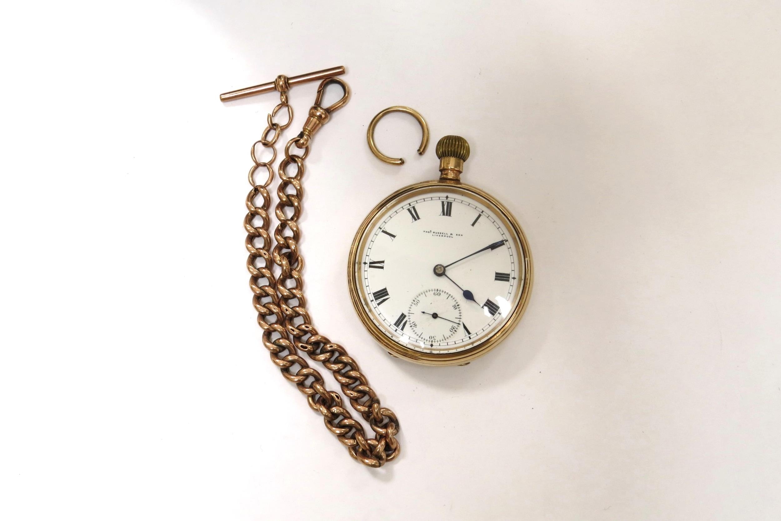 A gold cased Thos. Russell & Sons, Liverpool pocket watch, case stamped 375, with a yellow metal