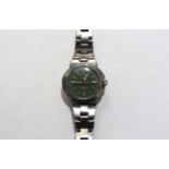 A ladies 1968 Omega Dynamic with green oval face, automatic