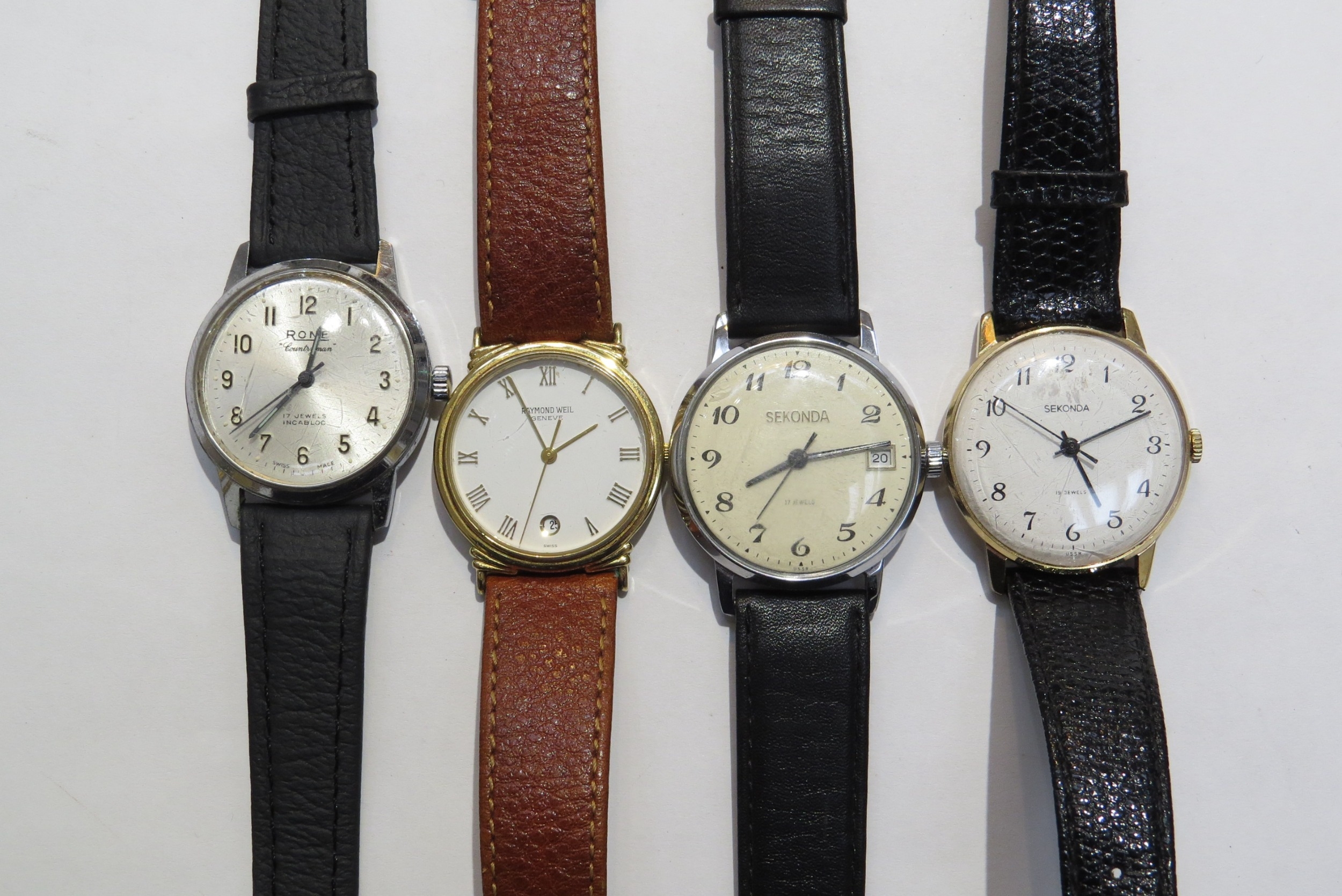 Four wristwatches Quartz and manual movements including two Sekonda (one missing back), Rone