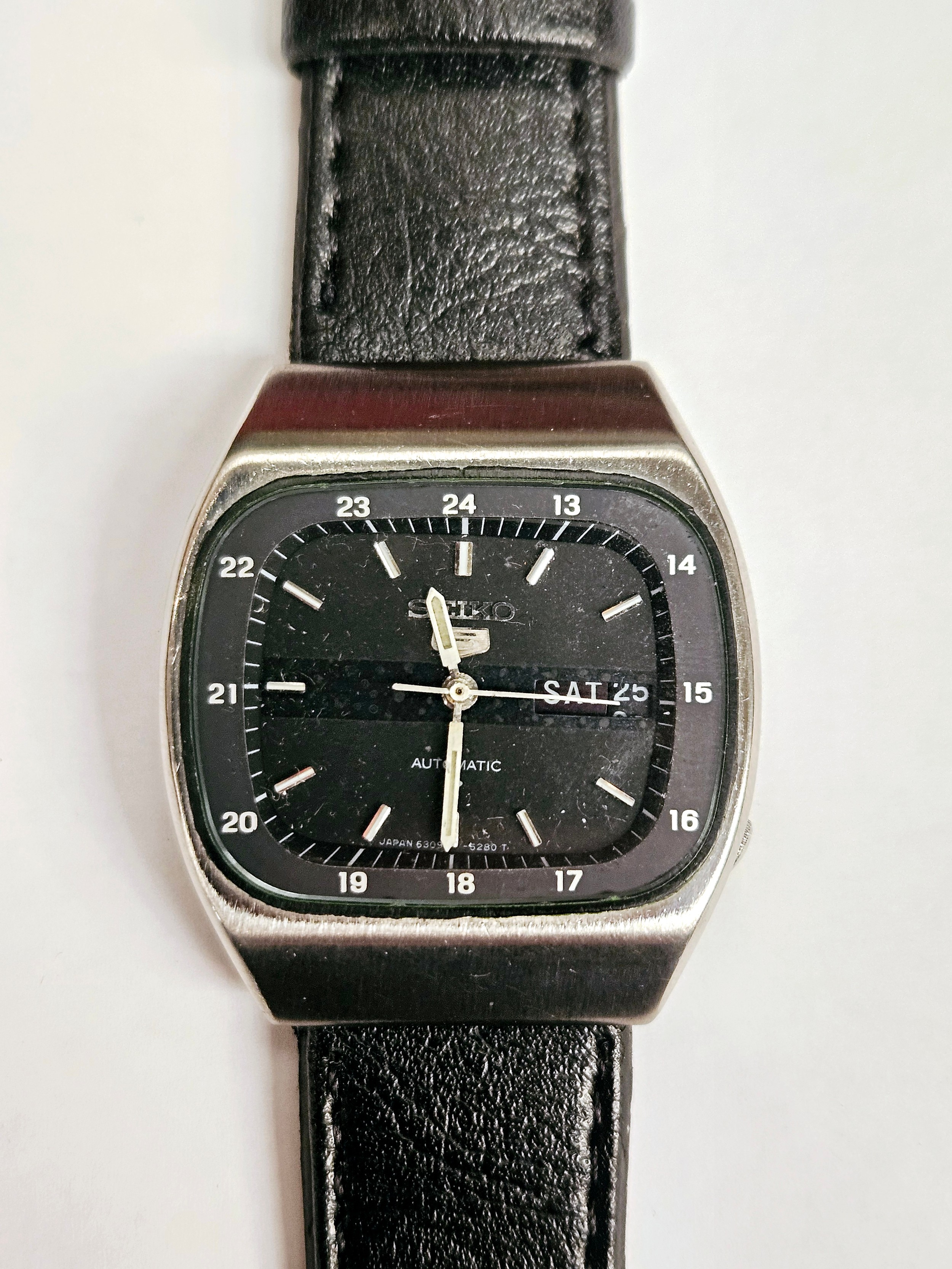 A circa 1980s Seiko 5 blue TV dial automatic wristwatch with day/date and 24-hour dial, on leather