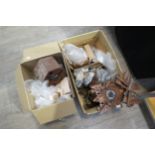 Two boxes of 20th Century cuckoo clock spares including cases, movements, pendulums, bellows etc