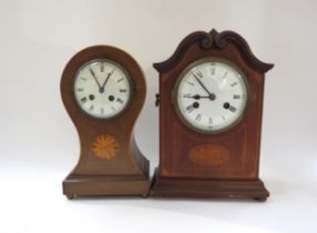 Two Edwardian mahogany csaed striking clocks with French/German movements, one of balloon form (2)