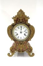 A French walnut cased striking mantel clock with Roman dial (a/f), brass mounts to case. 30cm high