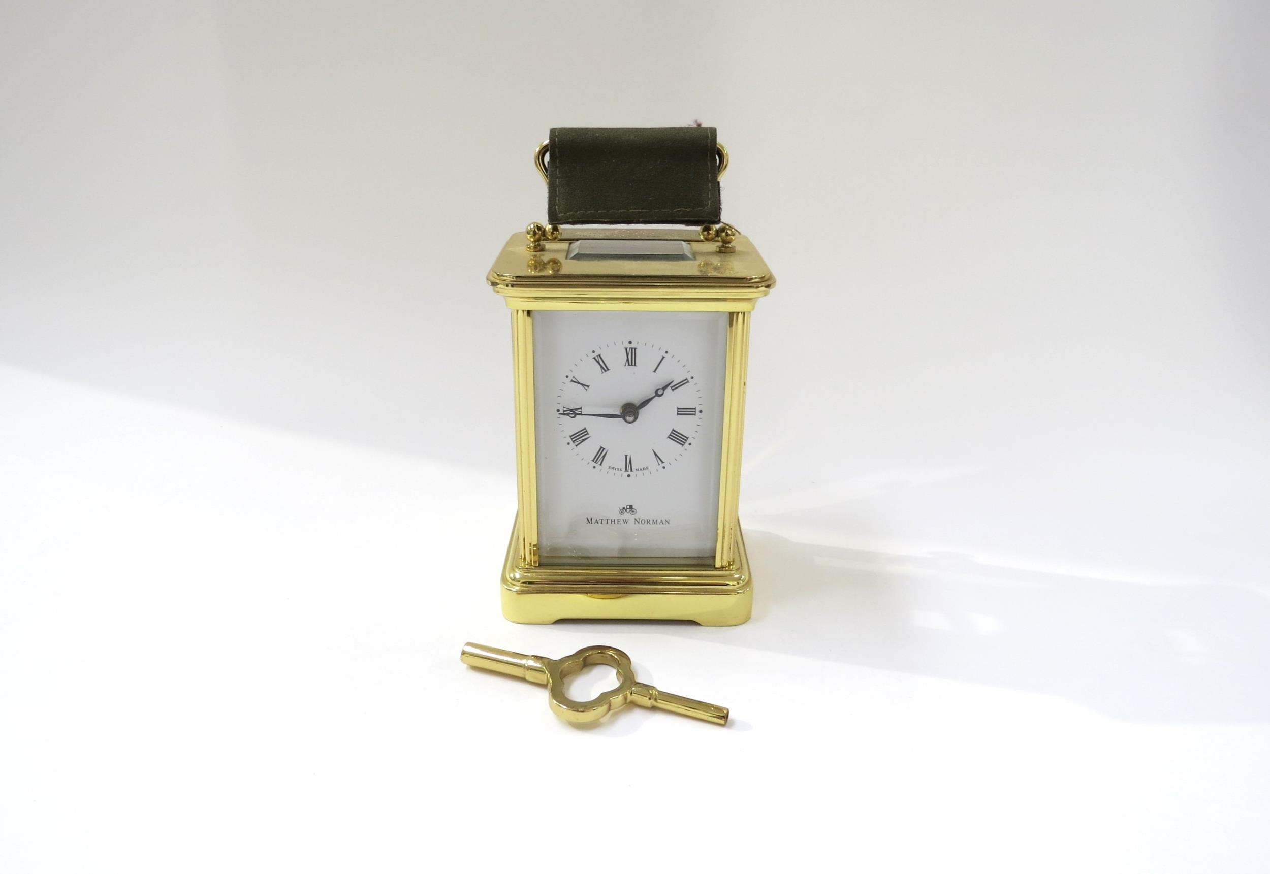 A late 20th Century Matthew Norman brass carriage clock, Switzerland movement marked 1754,