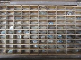 A large collection of mixed watch glasses of various sizes and materials