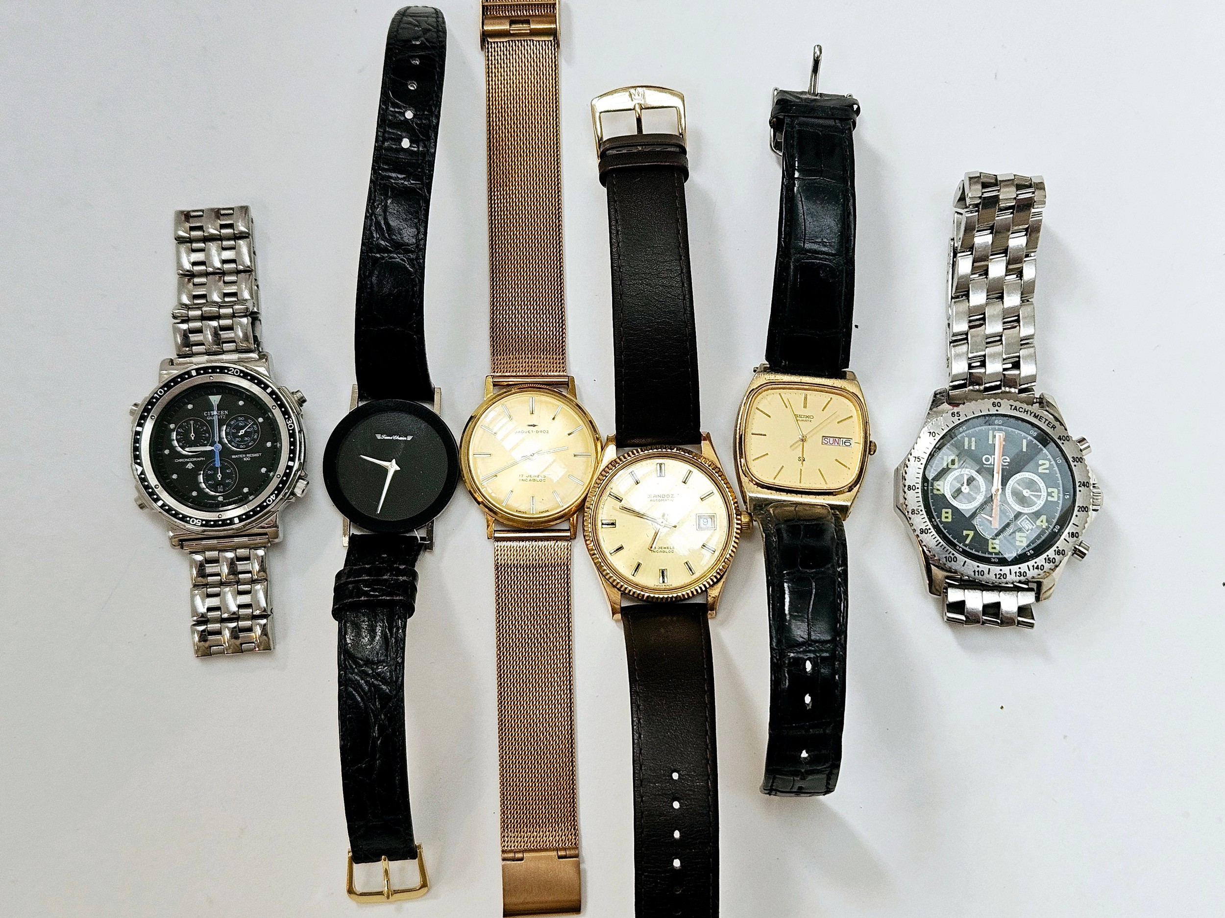 A group of wristwatches/chornographs including Citizen, Sandoz, Jaquet Dorz, etc