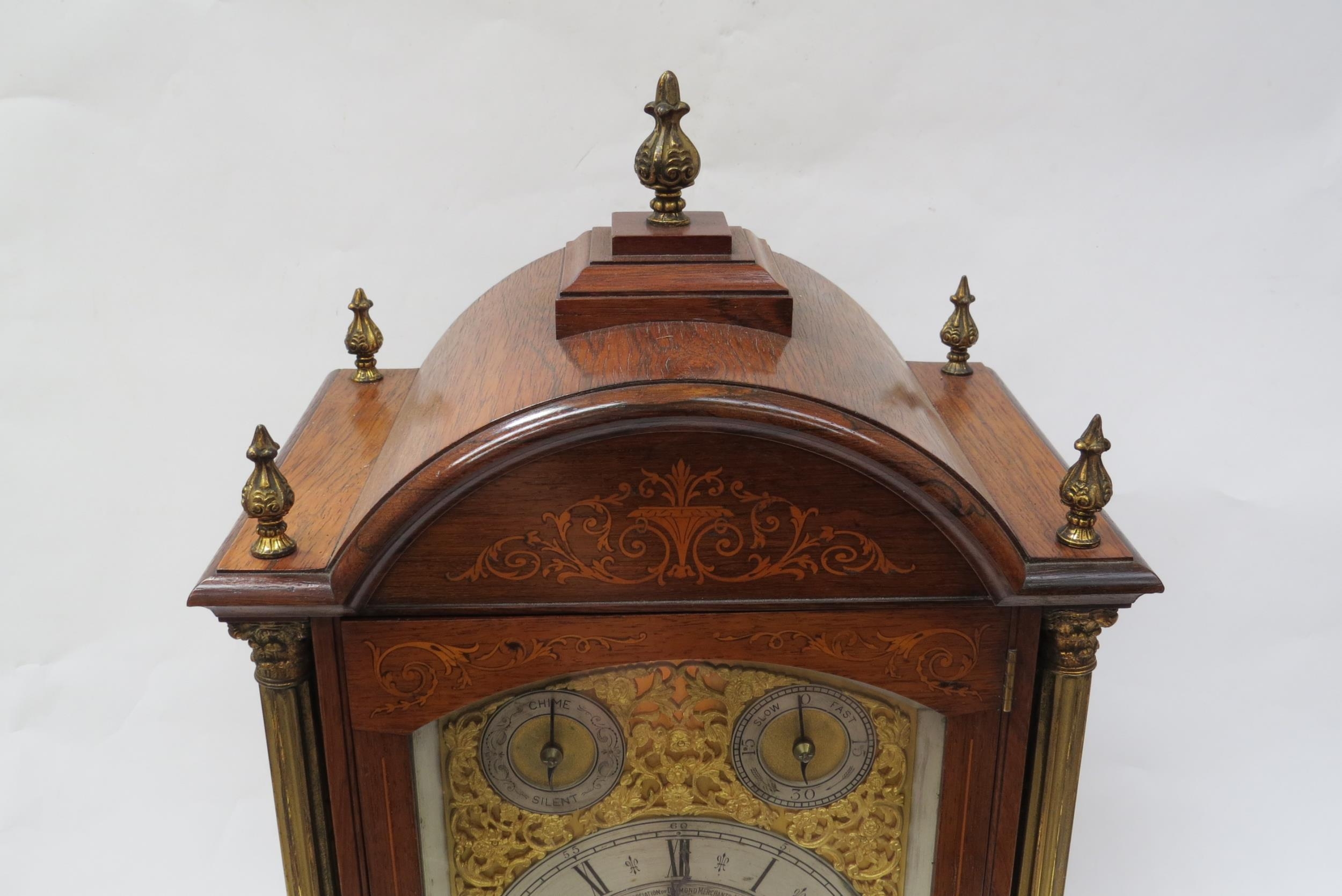 A late 19th Century oak and inlaid bracket clock with silvered Roman chapter ring over gilded - Image 2 of 10