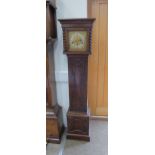 An early 20th Century oak cased striking and chiming grandmother clock with mainspring driven