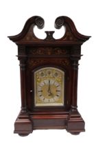A late 19th Century mahogany cased bracket clock with Roman silvered chapter ring, Dodge & Co.