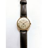 A vintage Tissot Jumbo gents wristwatch, it has an off-white dial with Arabic numeral hour markers