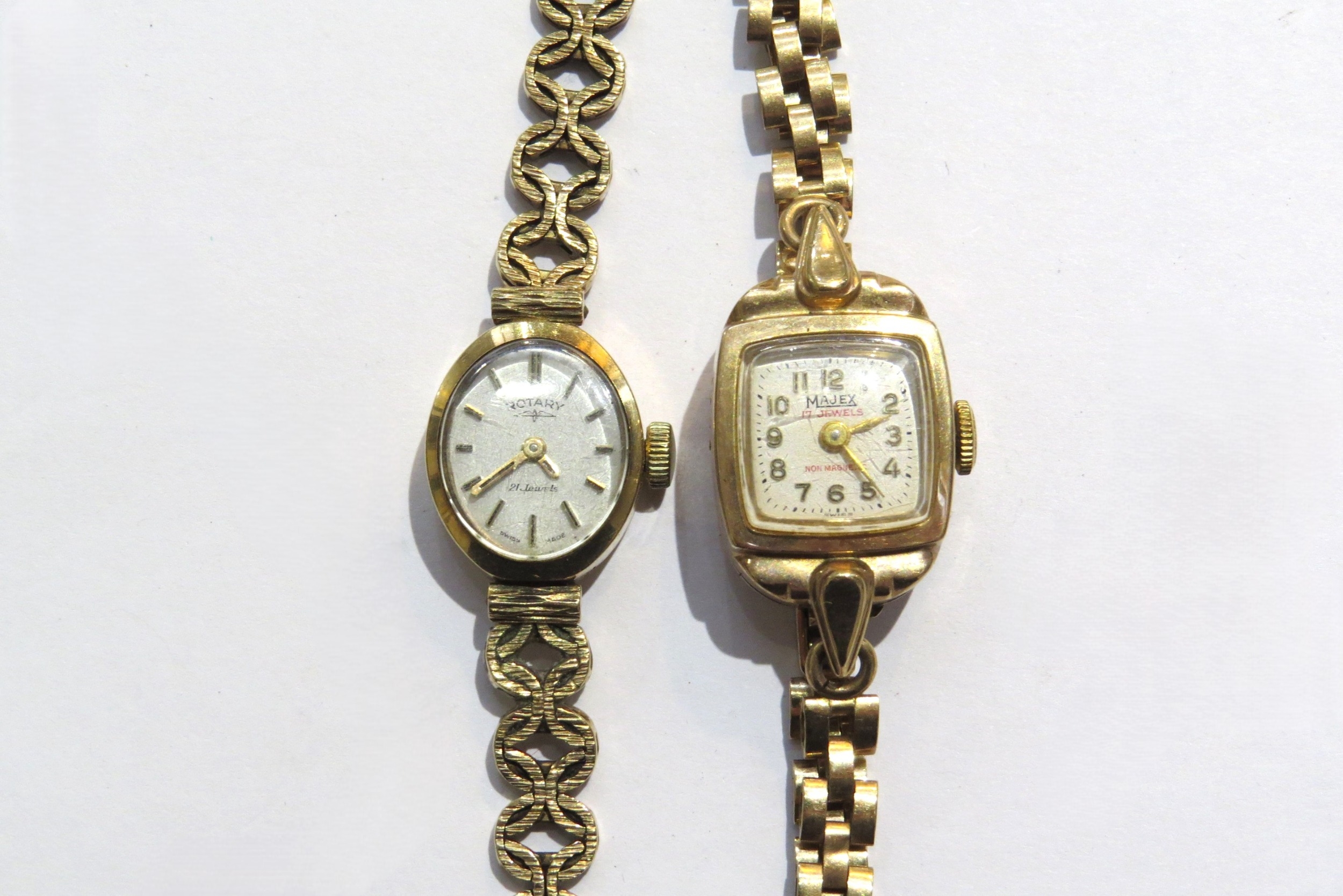 A 9ct gold Majex non magnetic wristwatch and Rotary 9ct gold 21 jewel wristwatch, gross weight 28g