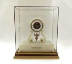 A late 19th Century Alabaster cherub on a swing mantel clock with open face, Roman chapter ring,