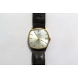 A 9ct gold Rotary 17 jewel Incabloc manual wind wristwatch with worn leather strap