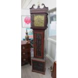 Circa 1830, An oak cased longcase clock with brass dial and chapter ring, with barley twist to hood.