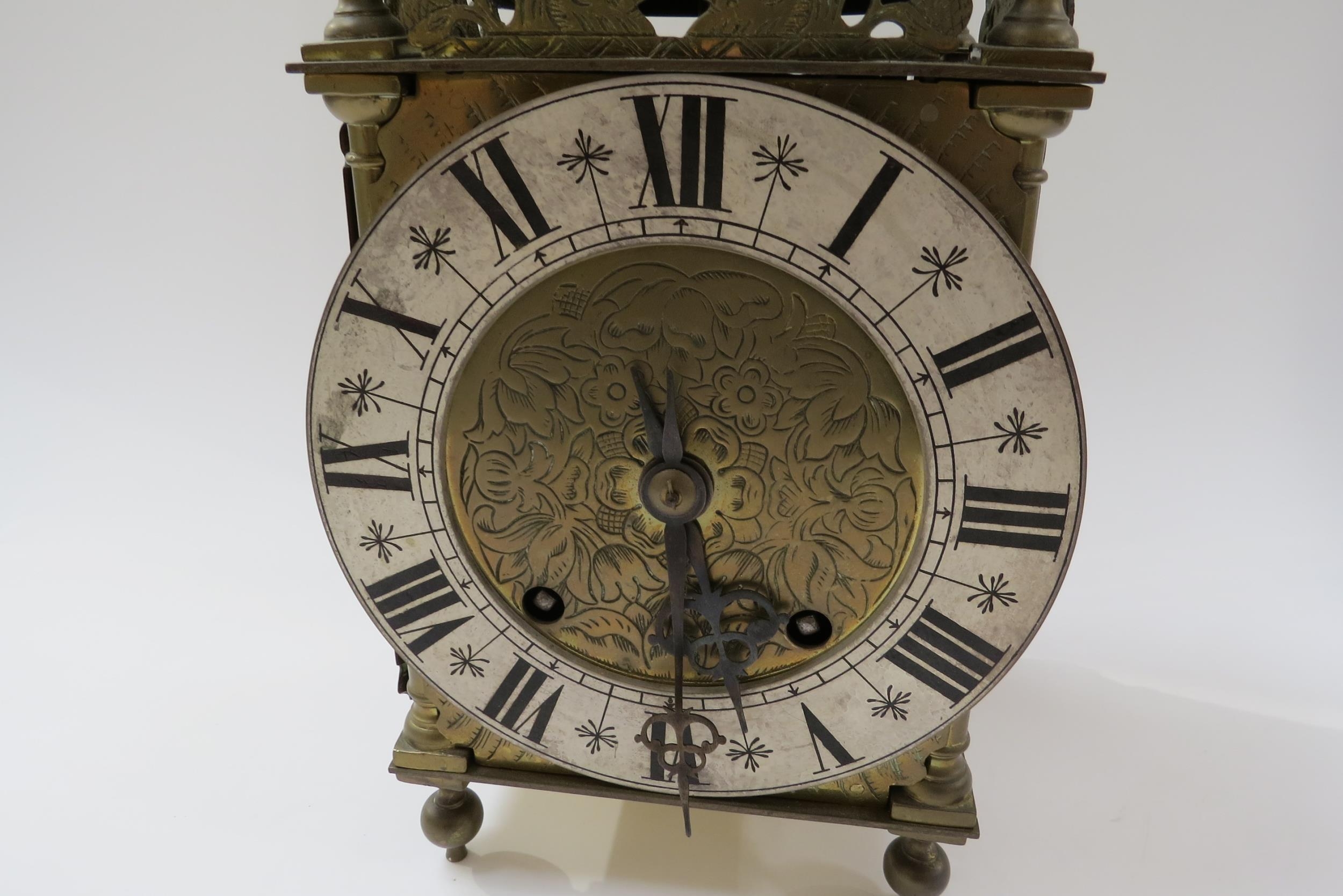 An early 20th Century brass lantern form striking clock with ting tang quaterly strike on two bells, - Image 2 of 5