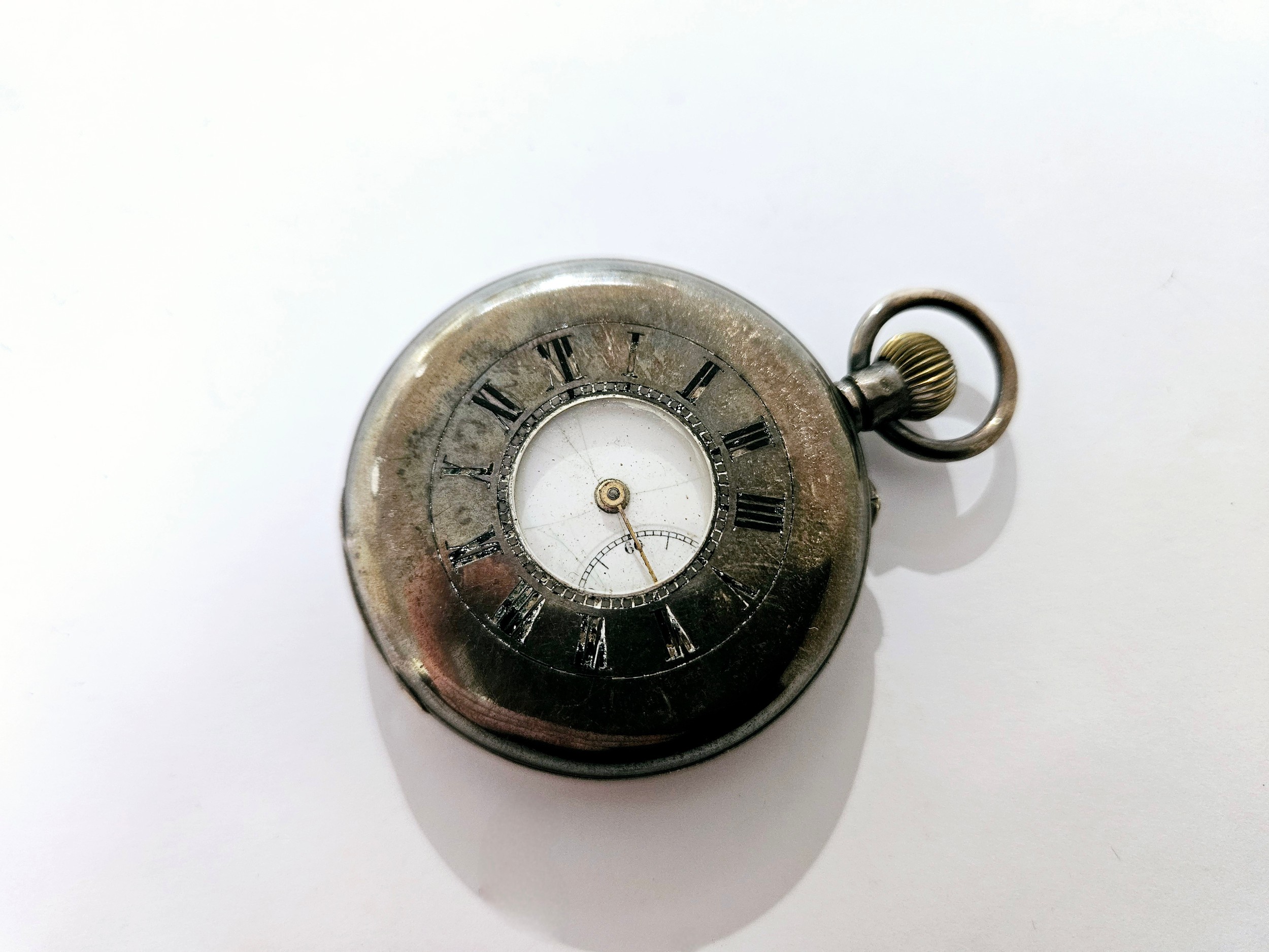 A silver half hunter pocket watch, stamped 925 to case. 91.7g overall